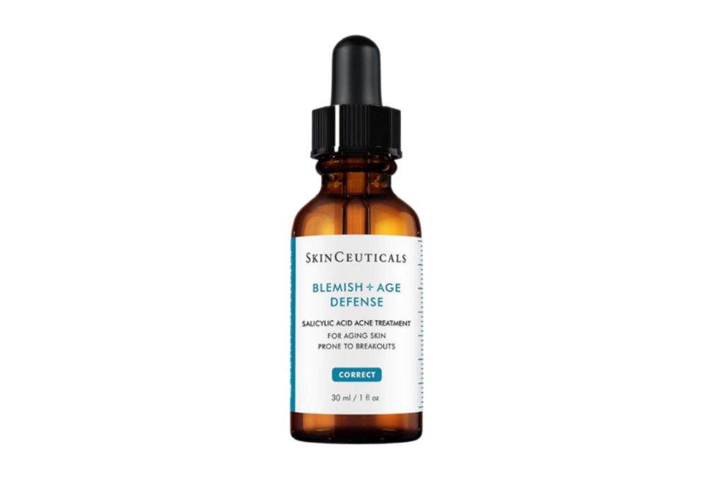 SkinCeuticals Blemish + Age Defense serum, a specialized oil-free treatment aimed at enhancing skin clarity and combating signs of aging, presented among other skincare products.